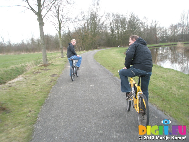 P1011269 Marijn and Pepijn cycling by river